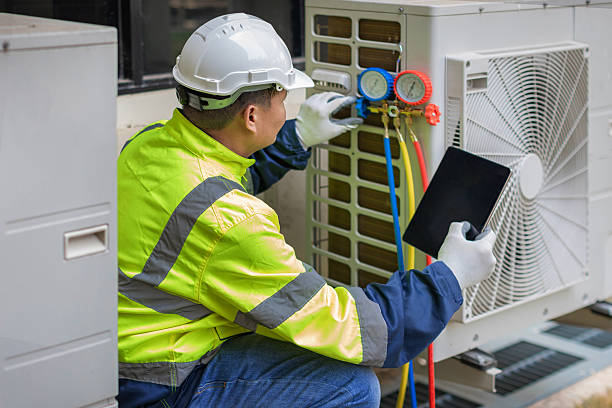 Professional Hvac technician working in South Easton, MA